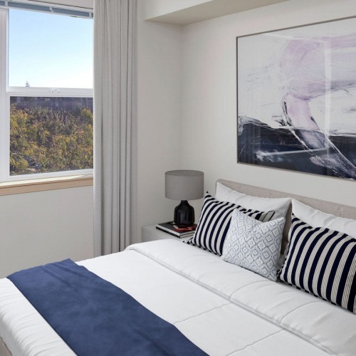Bedroom rendering of bedroom showing natural light through window and large open space for bed and furniture