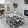 rendering of living room showing ample space for couches and furniture and natural lighting through window