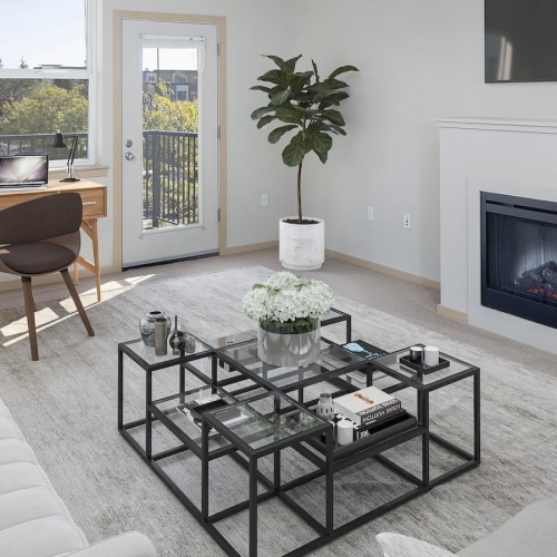 Living Room rendering of living room showing ample space for couches and furniture and natural lighting through window