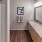 well lit bathroom with long, two sink counter