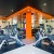 well equipped fitness room with many windows
